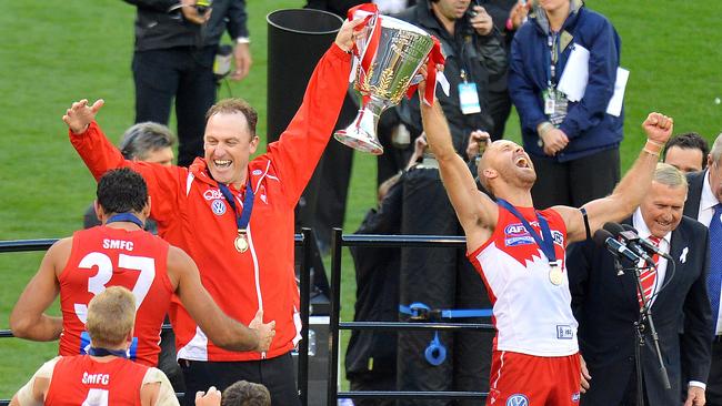 John Longmire and Jarrad McVeigh tasted premiership success in 2012.