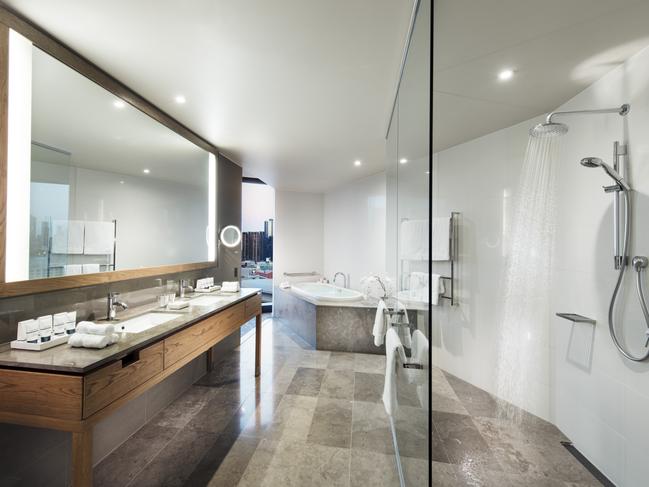 A luxurious bathroom, including a bathtub with a view, at Pan Pacific Melbourne. Picture: Adam Bruzzone