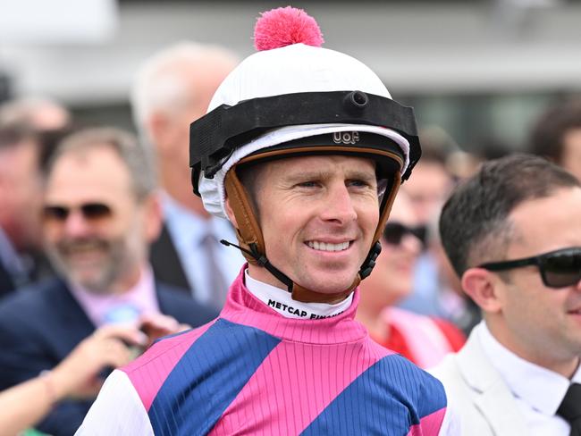 MELBOURNE, AUSTRALIA - NOVEMBER 09: Jye McNeil riding  Rey Magnerio after winning Race 4, The Cirka Always Welcome Stakes - Betting Odds during Champion Stakes Day at Flemington Racecourse on November 09, 2024 in Melbourne, Australia. (Photo by Vince Caligiuri/Getty Images)