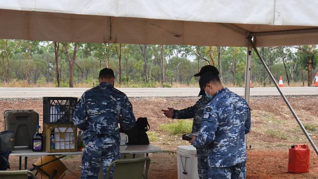 ADF staff assist NT Police at the southern border control point in Katherine. Picture: Amanda Parkinson