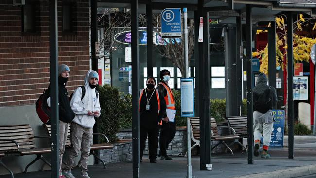 People waiting for a bus at Strathfield station for their morning commute. Picture: NCA NewsWire / Adam Yip