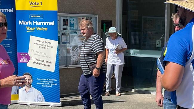 Division 1 councillor Mark Hammel talking to residents outside the Ormeau pre-poll in the 2024 Gold Coast City Council election.