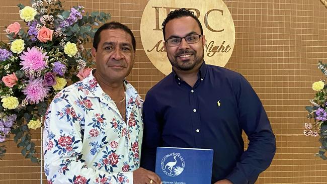 JCU Nguma-bada Spirit Award recipient, Roderick Mabo (right) with Indigenous Education Research Centre Student Support Advisor Eddie Savage.