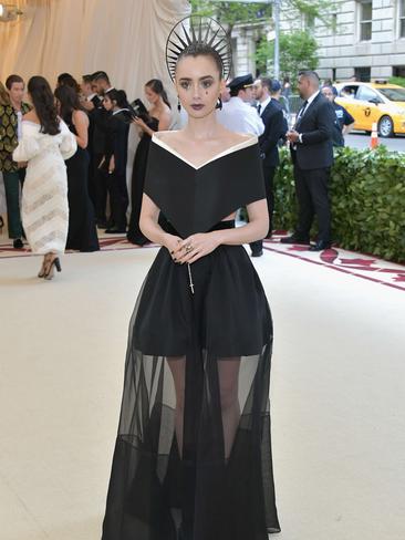 Lily Collins wears a Givenchy gown to the 2018 Met Gala. Picture: AFP