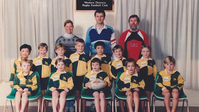 Wallabies captain Michael Hooper (front row, far right) in his days in the Wests Under-7s in Brisbane when mum Raeleen (top row, back left) was manager and brother Richard (middle row, third from left) was a teammate. Picture: Supplied