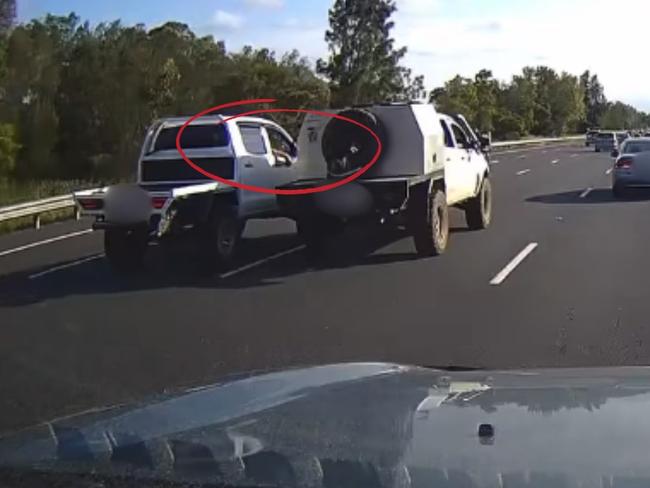 The moment a ute caused another vehicle to spin across a busy motorway in NSW has been captured on dashcam. Picture: Dash Cam Owners Australia Facebook