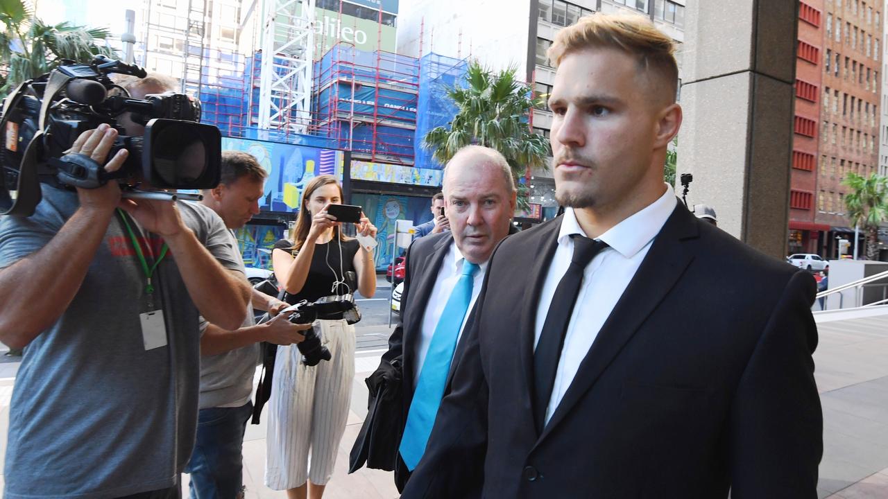 NRL player Jack De Belin (right) arrives at the NSW Federal Court 