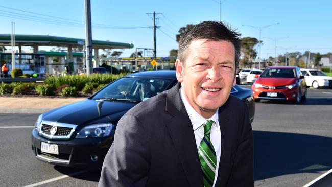 Minister for Roads Luke Donnellan at the notorious roundabout this morning. Picture: Dennis Manktelow