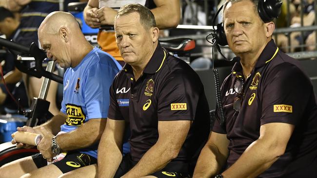 Broncos coach Kevin Walters is flanked by Allan Langer (left) and his brother, Steve Walters, during Saturday night’s loss to North Queensland in Mackay. Picture: Ian Hitchcock/Getty Images