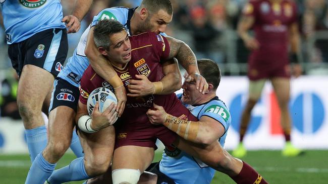 Corey Parker in one of the thousands of tackles he was involved in. Picture: Peter Wallis