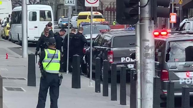 Police broke the windows in the car to remove the driver.