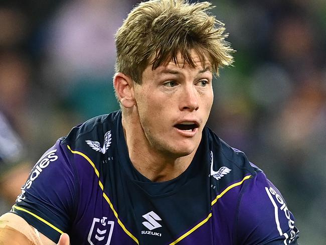 MELBOURNE, AUSTRALIA - APRIL 16:  Harry Grant of the Storm offloads the ball during the round six NRL match between the Melbourne Storm and the Sydney Roosters at AAMI Park on April 16, 2021, in Melbourne, Australia. (Photo by Quinn Rooney/Getty Images)