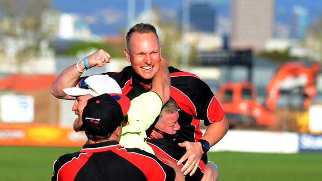 Tea Tree Gully coach Justin Maschotta celebrates the club’s 2018 grand final win. Picture: Brenton Edwards