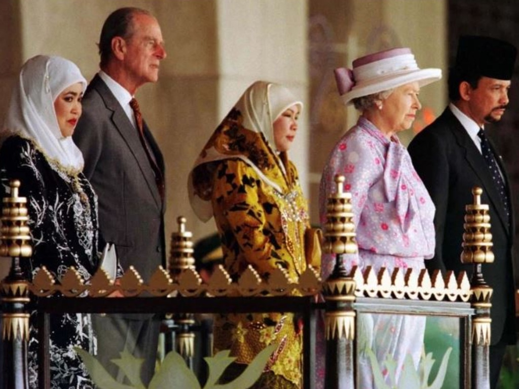 Queen Elizabeth II and Prince Philip with the Sultan and Queen Seleha in 1998. Picture: tthesun.co.uk
