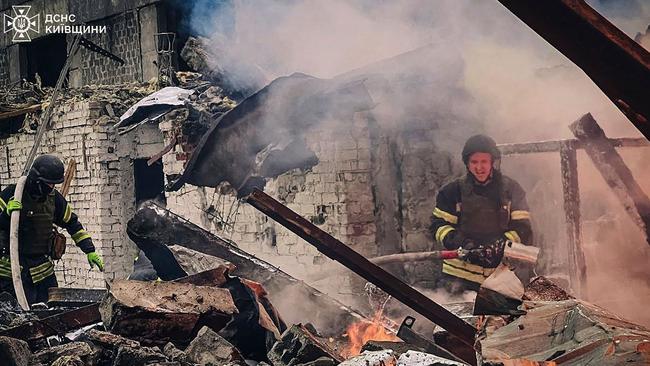 Firefighters at the site of a Russian strike in Brovary, near Kyiv. Picture: State Emergency Service of Ukraine/AFP