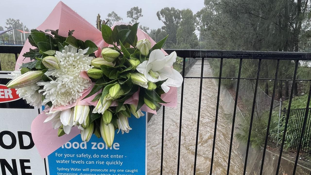 Floral tributes at Dunmore St, Wentworthville a day after the fatality.