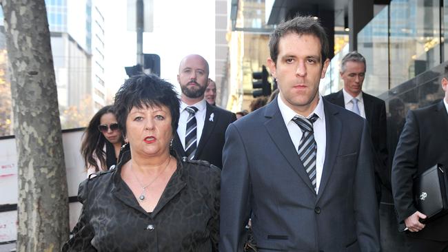 Edith McKeon with her daughter Jill’s husband Tom Meagher leaving the Supreme Court in Melbourne after the sentencing of killer Adrian Bailey