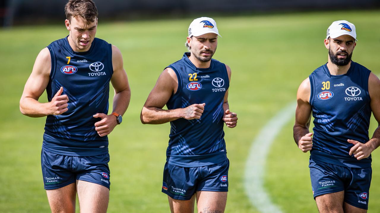 Riley Thilthorpe, Izak Rankine and Wayne Milera run laps during the pre-season at West Lakes. Picture: Tom Huntley