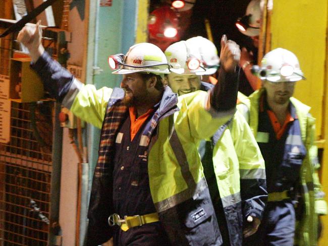 Rescued miners Todd Russell and Brant Webb wave as they walk from lift after they were caught underground. Picture: Supplied