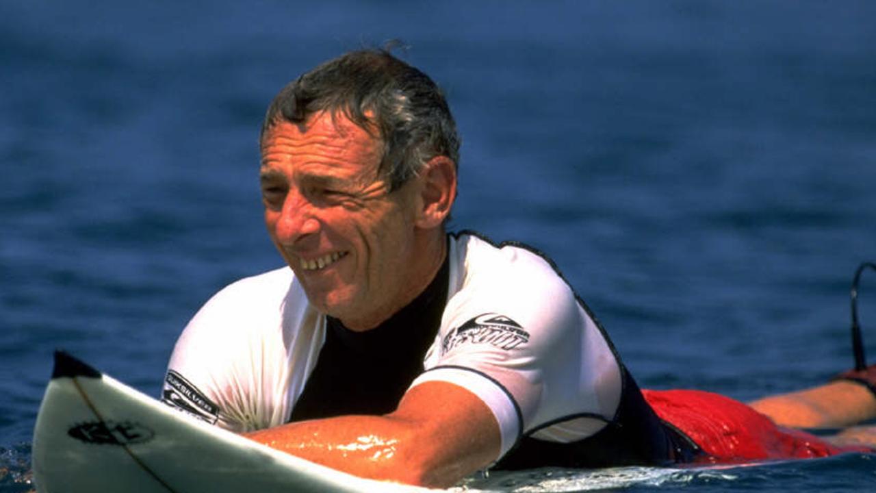 Quiksilver surfwear company founder Alan Green on surfboard in Sydney, NSW Nov 2002.