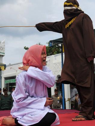 Woman Publicly Caned In Indonesia For Being In “close Proximity” To A ...