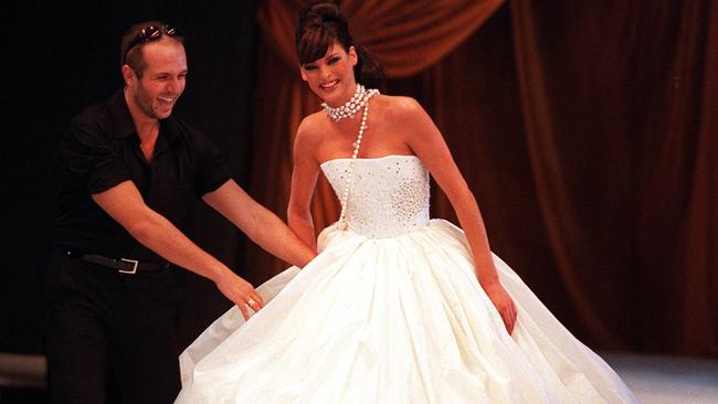 Supermodel Linda Evangelista with designer Alexander Perry at the 1997 Australian Fashion Week parade.