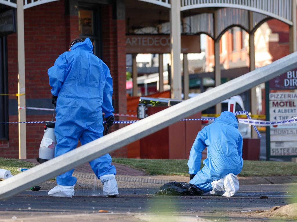 Investigators at the scene on Monday. Picture: Brendan Beckett