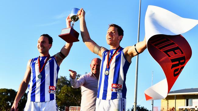 Renmark Rovers Football Club players collect the Riverland Football League trophy. Picture: Grant Schwartzkopff