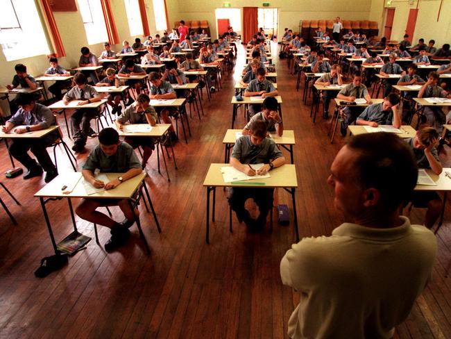 Ashfield Boys High school students sitting for the ELLA literacy test, Mar 01 1999 NSW / Education / Exams examinations classroom pupils teacher Generic