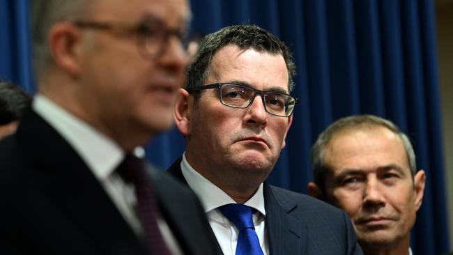 Victorian Premier Daniel Andrews (centre) and West Australian Premier Roger Cook watch Prime Minister Anthony Albanese speaks during a press conference following a national cabinet meeting in Brisbane. Picture: Dan Peled/NCA NewsWire