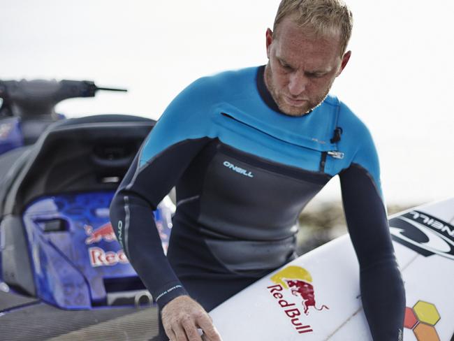 Mark Mathews prepares to surf at Botany Bay in 2014.