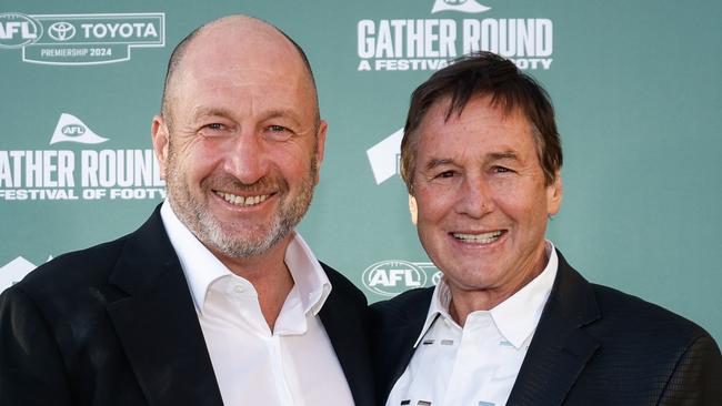 ADELAIDE, AUSTRALIA - APRIL 03: Jeff Browne and Craig Kelly pose for a photo before the 2024 AFL Gather Round Welcome Dinner Event at Glenelg Foreshore on April 03, 2024 in Adelaide, Australia. (Photo by Dylan Burns/AFL Photos via Getty Images)