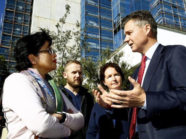 Health Workers Sophie Jacob, Martin Gray and Kathy Power listen to Incumbent Member for Kingsford Smith Matt Thistlethwaite outside Prince of Wales Hospital in Randwick. Picture: John Appleyard