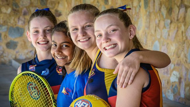 Hectorville Sports and Community Club has been promised $280,000 for new women's changerooms, which could be used by Zoe, 12, Sayuni, 11, Ellie, 13, and Emily, 15. Picture: AAP/Roy VanDerVegt