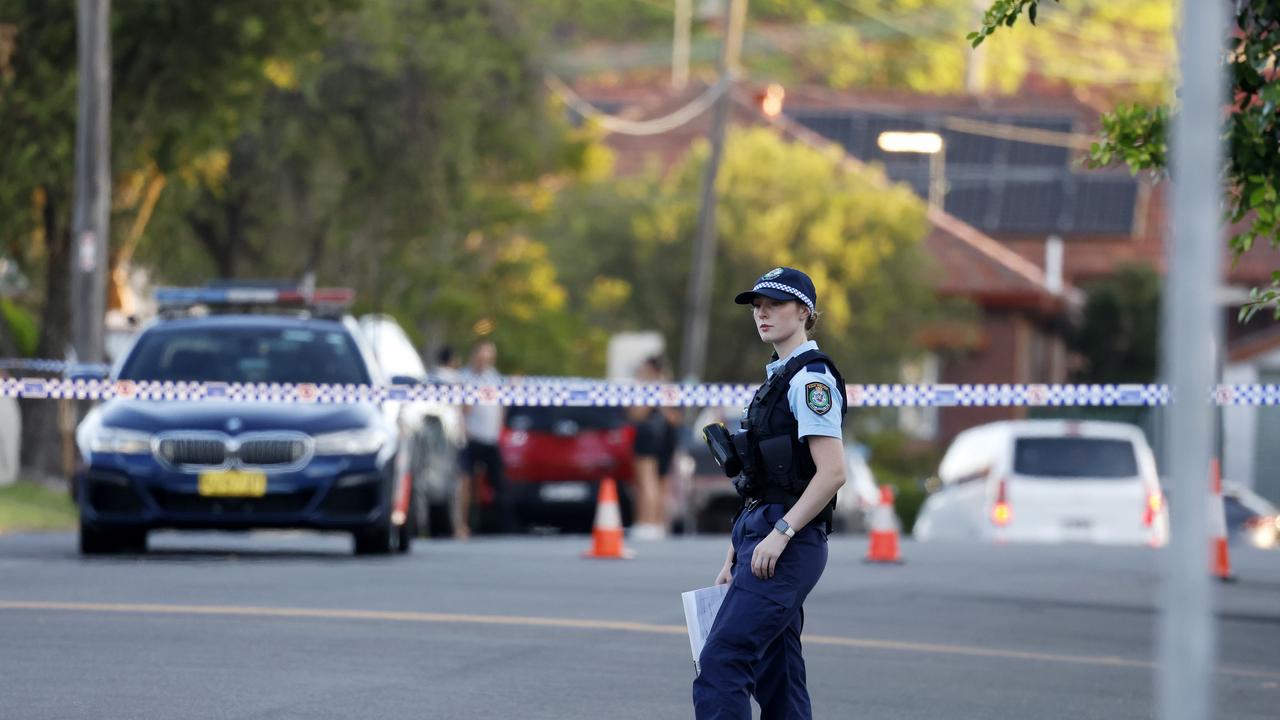 Police have taped off most of the street. Picture: Jonathan Ng