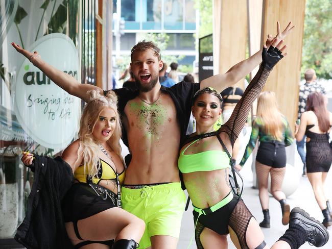 Hollie Tayla, 22, Yarrabilba, Jack McCarthy, 22, Meadowbrook, and Lilly Tobin, 20, Meadowbrook, on their way to Listen Out music festival. Picture: Liam Kidston