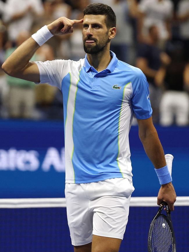 Novak Djokovic said it all with his gesture. Photo by AL BELLO, Getty Images via AFP.