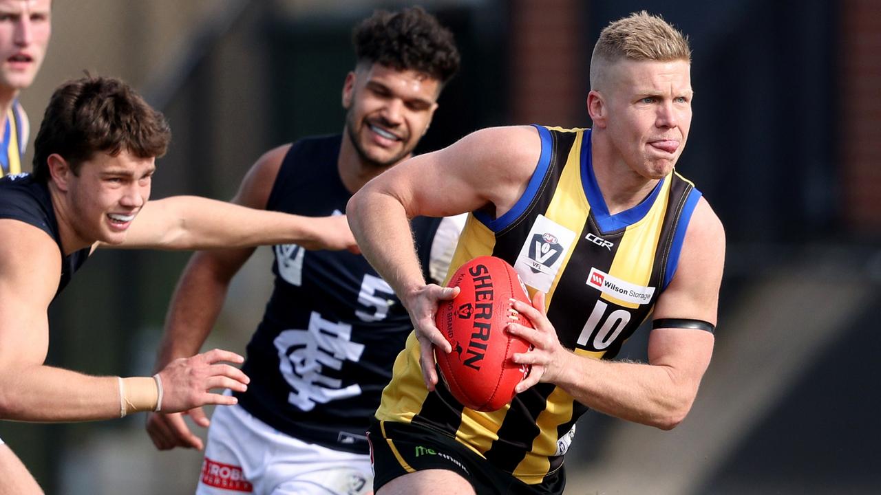 Daniel Hannebery warms up for AFL action in the VFL.