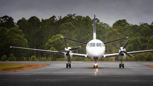 A REX flight arrives at Grafton airport.