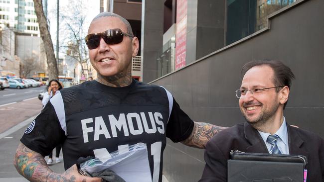 Mitchell outside court with his lawyer during a previous hearing. Picture: Jay Town