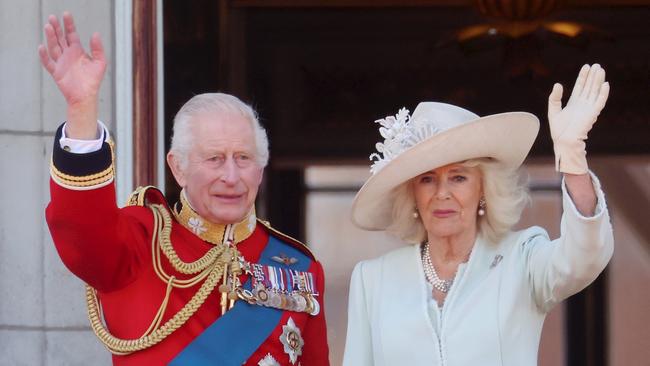 LONDON, ENGLAND - JUNE 15: King Charles III and Queen Camilla during Trooping the Colour at Buckingham Palace on June 15, 2024 in London, England. Trooping the Colour is a ceremonial parade celebrating the official birthday of the British Monarch. The event features over 1,400 soldiers and officers, accompanied by 200 horses. More than 400 musicians from ten different bands and Corps of Drums march and perform in perfect harmony. (Photo by Chris Jackson/Getty Images)