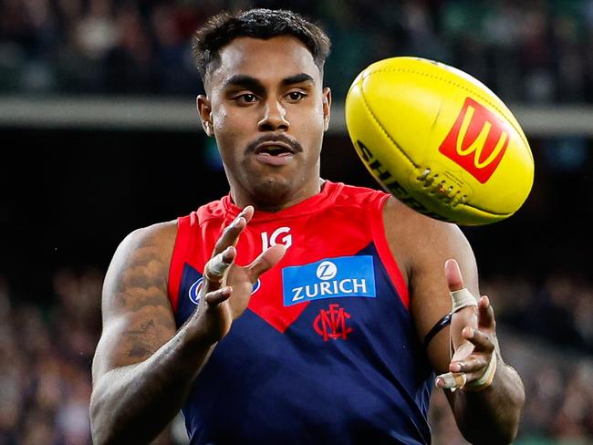 MELBOURNE, AUSTRALIA - AUGUST 23: Kysaiah Pickett of the Demons gathers the ball during the 2024 AFL Round 24 match between the Melbourne Demons and the Collingwood Magpies at The Melbourne Cricket Ground on August 23, 2024 in Melbourne, Australia. (Photo by Dylan Burns/AFL Photos via Getty Images)