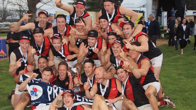 Riddell players celebrate their 2013 RDFL premiership.