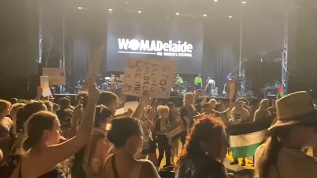 WOMADelaide now: Protest circle at the end of Ziggy Marley concert. Clearly more than 100 people. Lots of other little groups. Very effective protest.