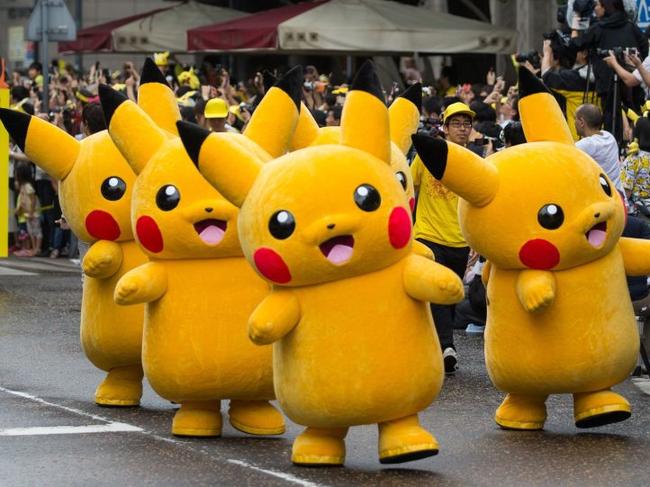 Nintendo hopes three new games starring Pikachu and other beloved Pokémon characters can help boost sales of the Switch game machine this year. Characters marched in the Pikachu Carnival Parade in Yokohama, Japan, last summer. PHOTO: JUE/EUROPEAN PRESSPHOTO AGENCY