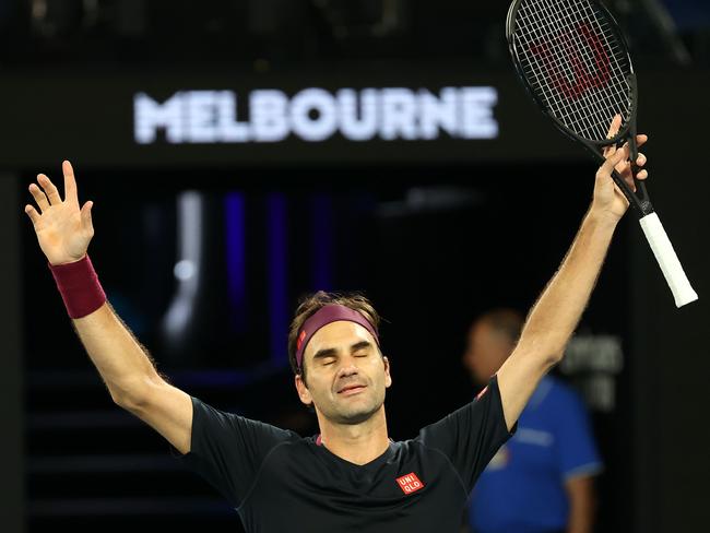 Switzerland's Roger Federer celebrates after victory against Australia's John Millman during their men's singles match on day five of the Australian Open tennis tournament in Melbourne on January 24, 2020. (Photo by DAVID GRAY / AFP) / IMAGE RESTRICTED TO EDITORIAL USE - STRICTLY NO COMMERCIAL USE