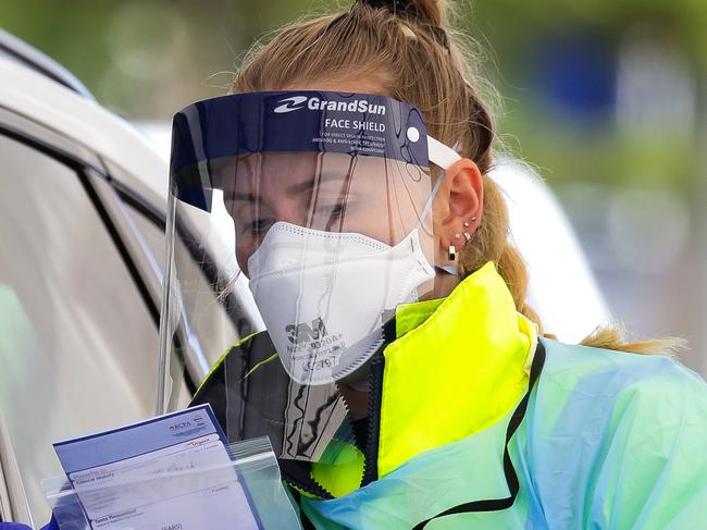 SYDNEY, AUSTRALIA - Newswire Photos AUGUST 10, 2021: Members of the public are seen lining up in their cars to have the Covid-19 test at the  Bondi Beach drive through testing clinic while Sydney remains in an ongoing Covid-19 Lockdown. Picture: NCA Newswire /Gaye Gerard