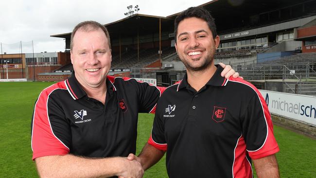 (L-R) Essendon president Simon Tobin, whose father Geoff made a century in the club’s last grand final win, and coach Mitch Johnstone. Picture: Josie Hayden.