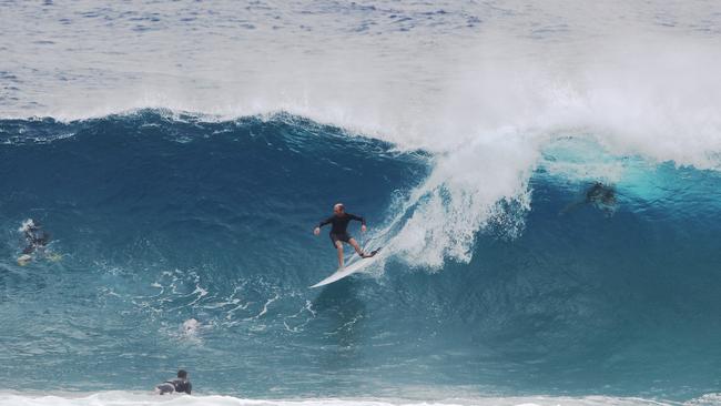 Surfers at Snapper Rocks and Kirra riding the Large swell produced by Cyclone OMA. Photograph : Jason O'Brien