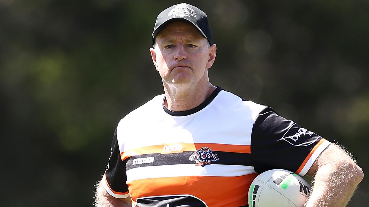 Wests Tigers coach Michael Maguire watches on during a training session